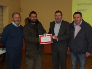 John O'Sullivan receiving his Preliminary Cert from Eamonn Magee, President of FIBKA with our Secretary, Gus McCoy and Education Officer, Donal Cooper in attendance. John O'Sullivan receiving his Preliminary Cert from Eamonn Magee, President of FIBKA with our Secretary, Gus McCoy and Education Officer, Donal Cooper in attendance.