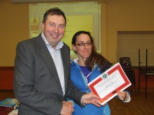 Rosmary Ryan receiving her Preliminary Cert from Eamonn Magee, President of FIBKA Rosmary Ryan receiving her Preliminary Cert from Eamonn Magee, President of FIBKA
